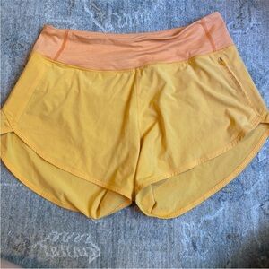 Outdoor voices orange running shorts L